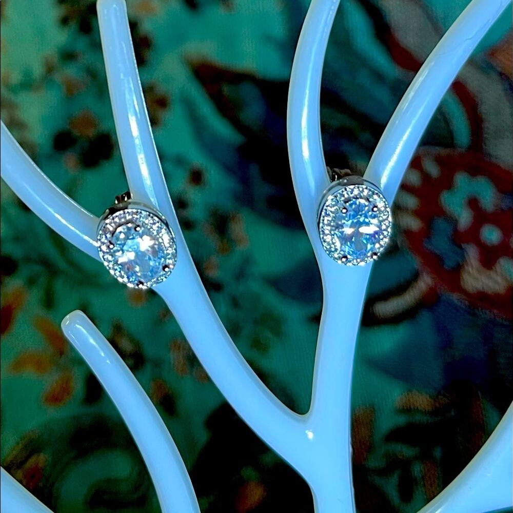 Simulated Diamond Oval Stud Earrings in Silvertone 3 ctw. Inspired by the halo